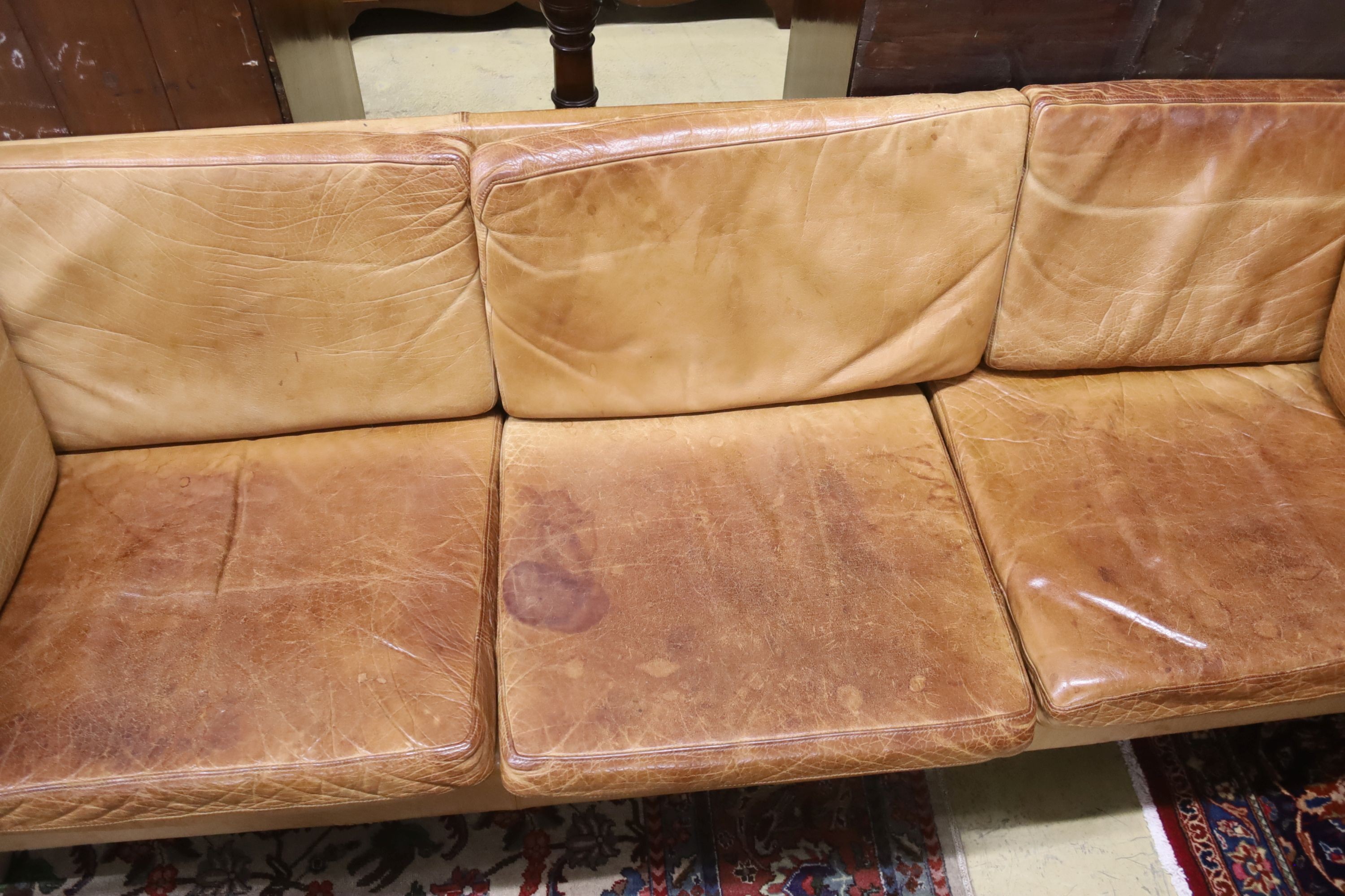 A Danish Borge Mogensen style tan leather three seater sofa, length 218cm, depth 78cm, height 66cm